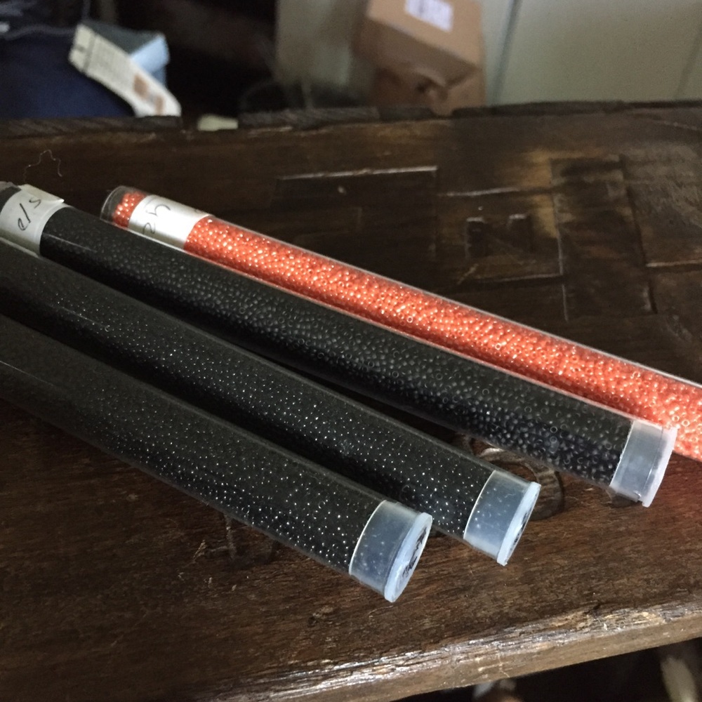 Miyuki tiny Delica glass beads 15/0 Black & orange tubes